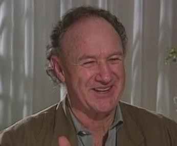 Gene Hackman w charakterystycznej roli, dynamiczne ujęcie podkreślające jego intensywną obecność na ekranie.